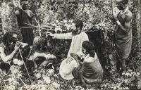 A dying man baptized in a forest