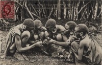 Akikuyu - Shepherd boys extracting a thorn from a lamb's foot