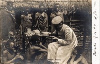 Missionary treating Akikuyu patients