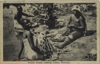 Swahili women washing clothes. Mombasa