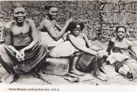 Native women combing their hair. B.E.A.