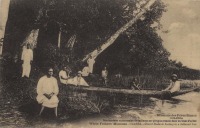 Church Students boating in a hollowed tree