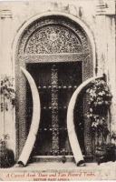 A carved arab Door & two record tusks