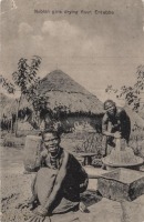 Nubian Girls drying flour, Entebbe