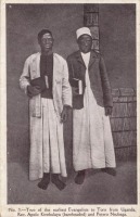 Two of the Earliest Evangelists to Toro from Uganda. Rev. Apolo Kivebulaya (bareheaded) and Petero Nsubaga