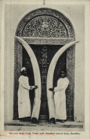 The two large Ivory Tusks with Zanzibar carved door