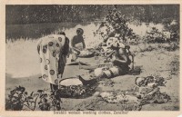 Swahili women washing clothes, Zanzibar