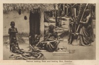 Natives Making Mats and beating Rice, Zanzibar